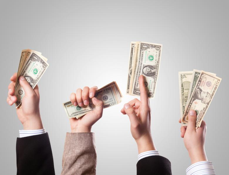 Hands holding money